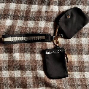 Lululemon dual pouch wristlet Black and gold brand new